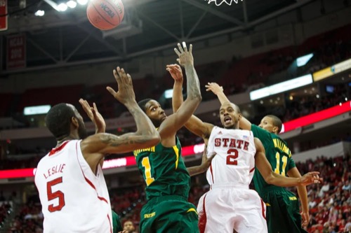 Rob Johnson (Norfolk State) and Lorenzo Brown (NC State) face off in NCAA tournament play