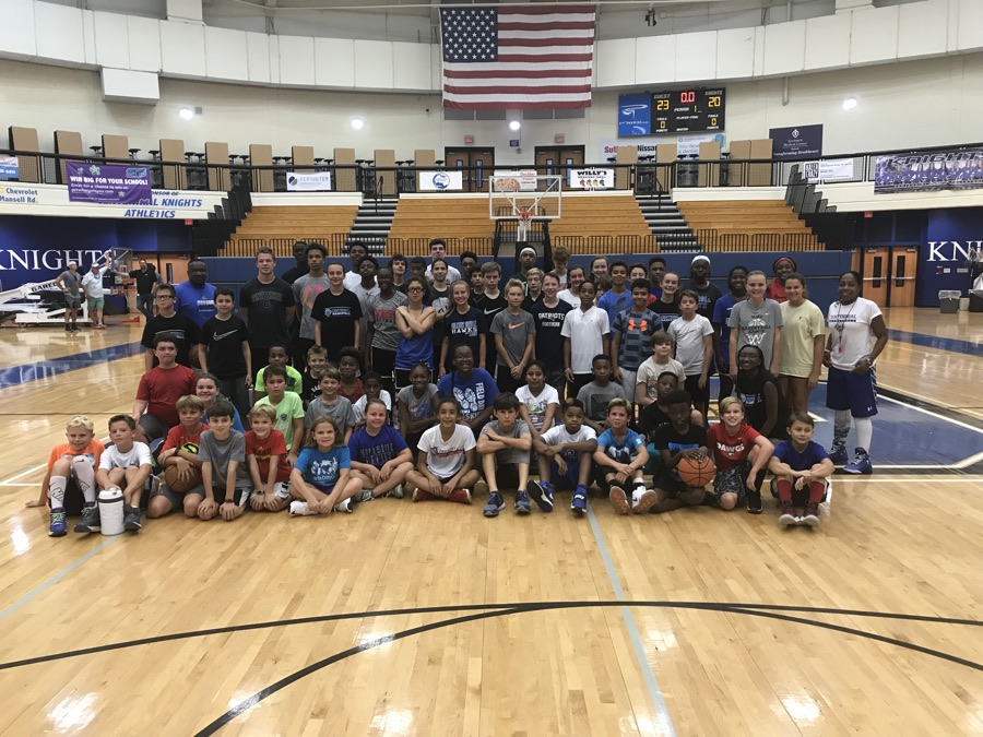 Large group of campers and coaches at a Centennial skill development camp